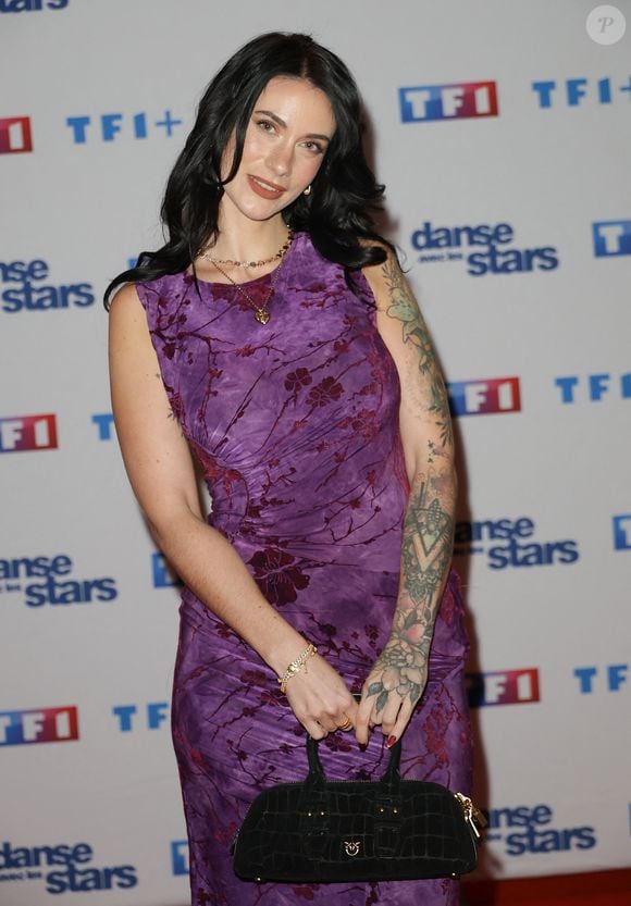 "Ça a été un peu le point noir de l'aventure (...) Je me suis dit ok, à tout moment ça peut s'arrêter. Donc à chaque fois je vivais mes danses comme si c’étaient les dernières", se souvient-elle. 

Maghla - Photocall de lancement de la saison 2026 de "Danse avec les stars" (DALS) au siège de TF1 à Boulogne-Billancourt le 18 décembre 2025. © Coadic Guirec/Bestimage