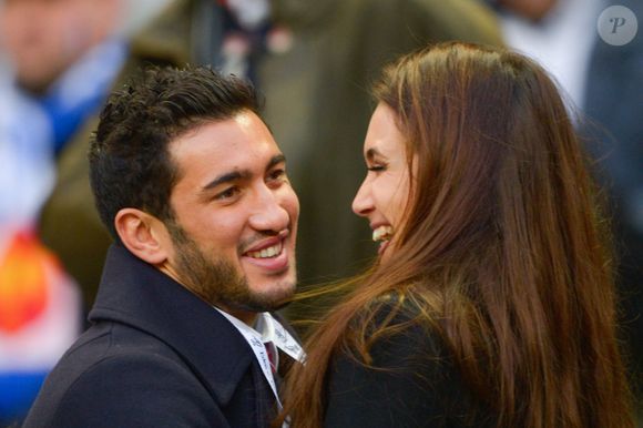 Maxime Mermoz et Barbara Morel lors du match du tournoi des VI Nations entre la France et l'Angleterre au Stade de France à Saint-Denis, le 1er février 2014