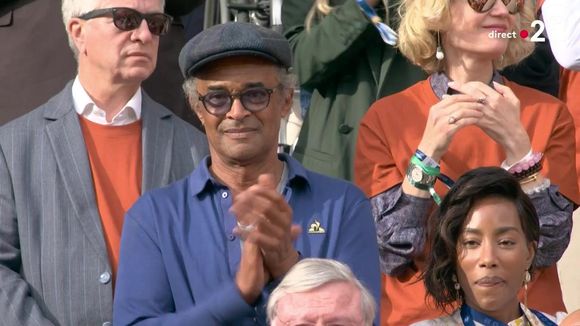 Yannick Noah et sa compagne Malika dans les tribunes de Roland Garros. Capture France 2