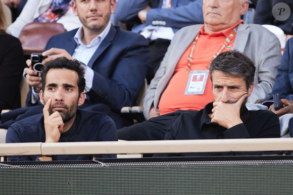 Martin Fourcade, Tony Estanguet - Les célébrités dans les tribunes des Internationaux de France de tennis de Roland Garros 2024 à Paris le 5 juin 2024. © Jacovides-Moreau/Bestimage