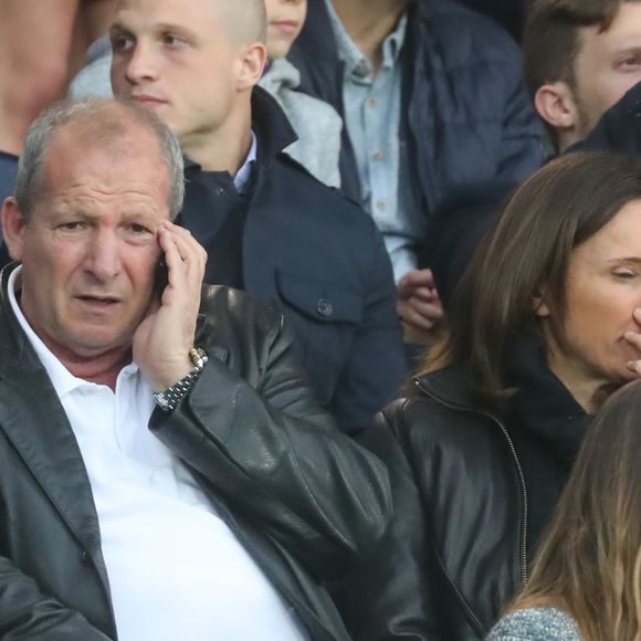 Rolland Courbis et sa femme Clara Paban Courbis dans les tribunes lors du match de Ligue 1 "PSG - Rennes" au Parc des Princes à Paris, le 12 mai 2018.
Agence / Bestimage