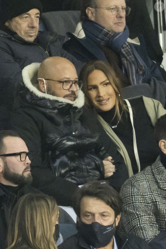 Vitaa (enceinte de son 3ème enfant) et son mari Hicham Bendaoud - People lors de la huitième de finale aller de la Ligue des champions entre le PSG et le Real Madrid au Parc des Princes à Paris le 15 février 2022. © Cyril Moreau/Bestimage