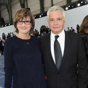 Michel Sardou et son épouse Anne-Marie Périer assistent au défilé de la collection prêt-à-porter printemps-été de Chanel qui s'est tenu au Grand Palais à Paris, France. Photo Thierry Orban/Abaca