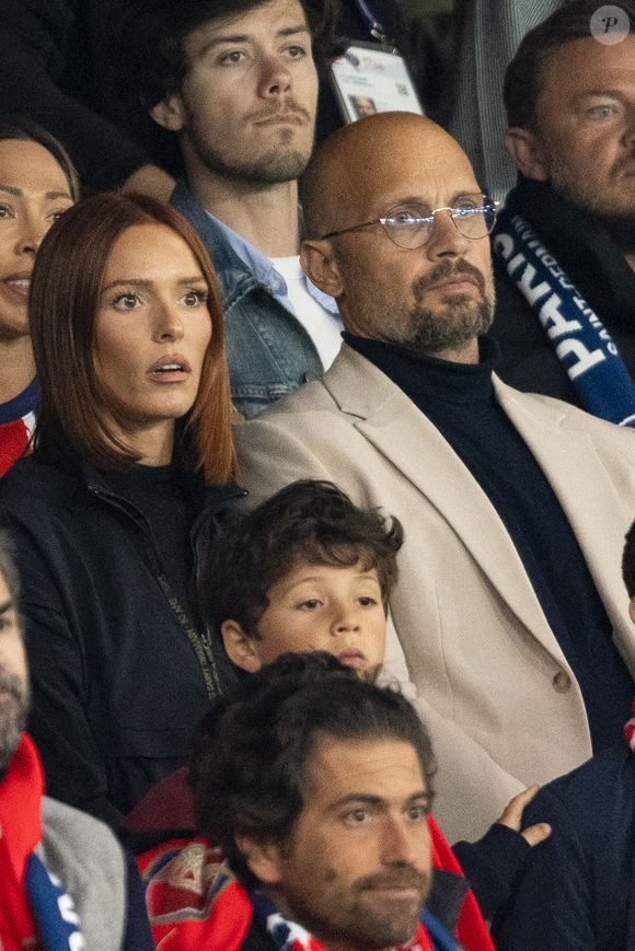 Maëva Coucke (Miss France 2018) et Loic Berardengo - Célébrités dans les tribunes lors du match retour de la Ligue Des Champions 2024-2025 (LDC) "PSG - Arsenal" (2-1) au Parc des Princes à Paris le 7 mai 2025. © Cyril Moreau/Bestimage