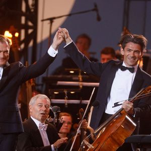 Renaud Capuçon, Gautier Capuçon - "Concert de Paris" sur le parvis de l'hôtel de ville de Paris retransmis en direct sur France 2 et sur France Inter, Paris le 14 juillet 2024. © Christophe Clovis - Pierre Perusseau / Bestimage