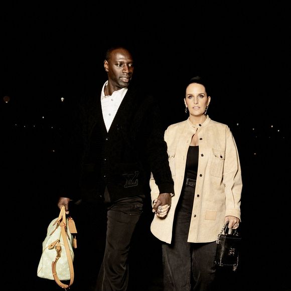 Omar Sy et sa femme Helene Sy arrivent au défilé Louis Vuitton pendant la semaine de la mode à Paris au Musée du Louvre à Paris, France, le 21 janvier 2025. Photo de Splash News/ABACAPRESS.COM
