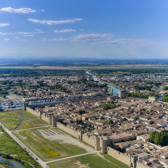 Aigues Mortes (30) : vue aerienne des remparts et de la cite medievale et du canal du Rhone a Sete -Photo by Lachas D/ANDBZ/ABACAPRESS.COM