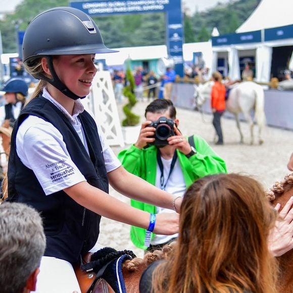 Nicolas Sarkozy, sa femme Carla Bruni et leur fille Giulia Sarkozy après le prix Kids Cup L’Envol dans l'Espace VIP lors de la 10ème édition du "Longines Paris Eiffel Jumping" à la Plaine de Jeux de Bagatelle à Paris, France, le 21 juin 2024. © Perusseau-Veeren/Bestimage