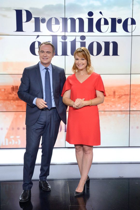 Christophe Delay et Adeline Francois, les presentateurs de la Premiere Edition de BFM TV posent pour une photo de rentree a Paris, France le 25 Aout 2017. Photo by Aurore Marechal/ABACAPRESS.COM
