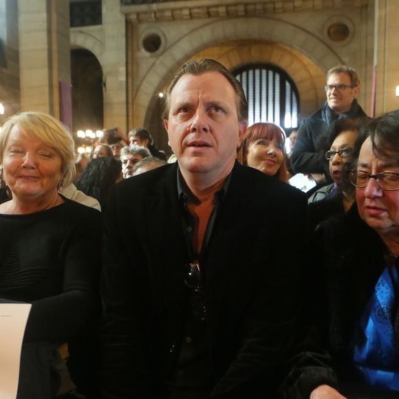 Claude François Junior (Jr), sa mère Isabelle Forêt lors de la messe hommage à Claude François en l'église Notre-Dame d'Auteuil à Paris le 10 mars 2018. Cette commémoration marque le 40ème anniversaire de la mort du chanteur. Ses obsèques ont été célébrées au même endroit le 15 mars 1978.
© CVS / Bestimage