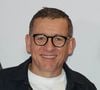Parmi les invités de marque, le comédien Dany Boon a fait une arrivée particulièrement remarquée.

Dany Boon au photocall de la première du film "Karma" au cinéma Pathé Palace à Paris le 13 octobre 2026. 

© Coadic Guirec / Bestimage