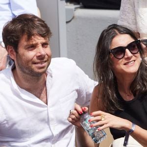 Agathe Lambret et Benjamin Duhamel dans les tribunes de la finale Dames des Internationaux de Tennis de Roland Garros à Paris, le 8 juin 2024. 

Photo : Jacovides-Moreau / Bestimage