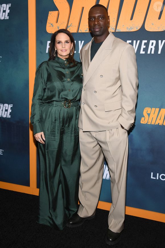 (De gauche à droite) Hélène Sy et l'acteur français Omar Sy assistent à l'avant-première new-yorkaise de « Shadow Force » de Liongate à l'AMC Lincoln Square 13, New York, NY, le 1er mai 2025. Photo par Anthony Behar/SPUS/ABACAPRESS.COM