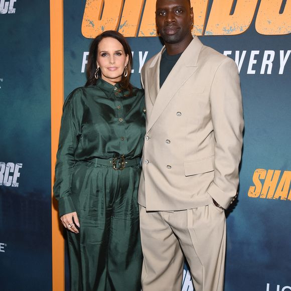 (De gauche à droite) Hélène Sy et l'acteur français Omar Sy assistent à l'avant-première new-yorkaise de « Shadow Force » de Liongate à l'AMC Lincoln Square 13, New York, NY, le 1er mai 2025. Photo par Anthony Behar/SPUS/ABACAPRESS.COM
