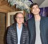 Philippe Besson et son compagnon Sofiane lors de l'inauguration du chalet éphémère "Les Neiges Courchevel" sur la terrasse de l'hôtel Barrière Le Fouquet's à Paris, France, le 27 novembre 2018. © Coadic Guirec/Bestimage
