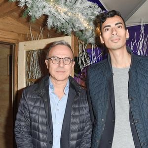 Philippe Besson et son compagnon Sofiane lors de l'inauguration du chalet éphémère "Les Neiges Courchevel" sur la terrasse de l'hôtel Barrière Le Fouquet's à Paris, France, le 27 novembre 2018. © Coadic Guirec/Bestimage