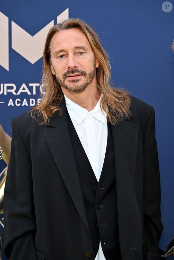 "J’étais devenu un monstre physiquement. Il me vient un vent de haine de certaines personnes qui ont posté des messages détestables. D’autres, heureusement, étaient beaucoup plus doux".
Bob Sinclar - 10ème édition du Gala de Charité de Patrick Mouratoglou à l'Académie Mouratoglou à Biot Sophia Antipolis.
© Bruno Bebert/Bestimage