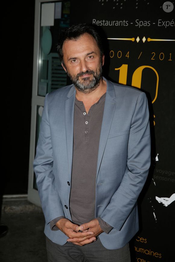Frederic Lopez participe à la soirée de célébration du 10ème anniversaire de Dans Le Noir ? au restaurant 'Dans le Noir ?' à Paris, France, le 14 juillet 2014. Photo par Jerome Domine/ABACAPRESS.COM