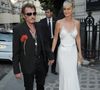 Somme des dettes héritées de Johnny Hallyday à sa mort 
Johnny Hallyday et sa femme Laeticia Hallyday - Arrivée des people à la soirée "Vogue Paris Foundation Gala" au palais Galliera à Paris, le 6 juillet 2015. Agence / Bestimage