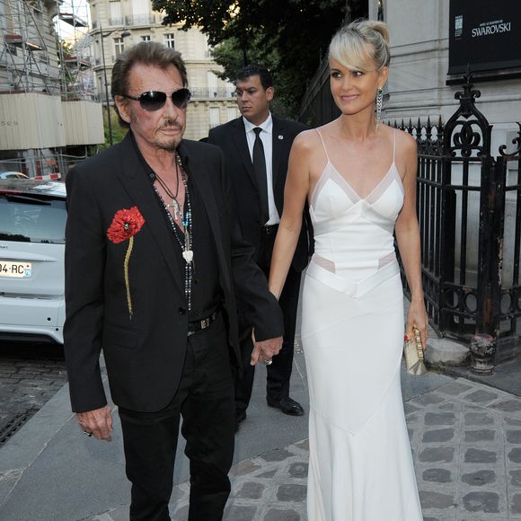 Somme des dettes héritées de Johnny Hallyday à sa mort 
Johnny Hallyday et sa femme Laeticia Hallyday - Arrivée des people à la soirée "Vogue Paris Foundation Gala" au palais Galliera à Paris, le 6 juillet 2015. Agence / Bestimage