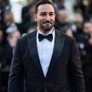 Adil Rami - Montée des marches du film " La vénus électrique " pour la cérémonie d'ouverture du 79ème Festival International du Film de Cannes, le 12 mai 2026. © Jacovides-Moreau /Bestimage