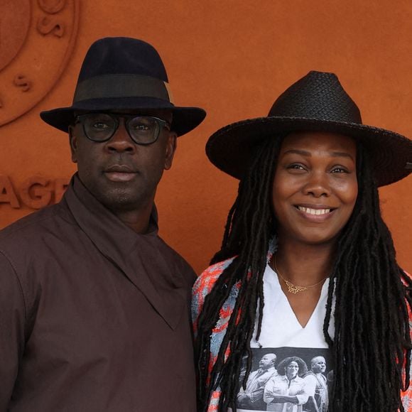 Lilian Thuram et sa femme Kareen Guiock Thuram - Célébrités au village des Internationaux de France de tennis de Roland Garros 2024 à Paris le 7 juin 2024.  © Jacovides-Moreau/Bestimage