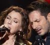 La chanteuse australienne possède en effet une maison juste à côté, à Nogent-sur-Marne. Tombée amoureuse de la France mais aussi d'un Français, Vincent Mancini, avec qui elle a partagé sa vie pendant de longues années, elle a toujours voulu un équilibre pour leur fils de 25 ans. 

Exclusif - Tina Arena et George Perris pour les surprises lors de l'enregistrement de l'émission "La Boîte à secrets", présentée par F.Bollaert et diffusée le 23 janvier sur France 3, dans les studios du Lendit à Saint-Denis, France, le 16 décembre 2025. © Cyril Moreau/Bestimage