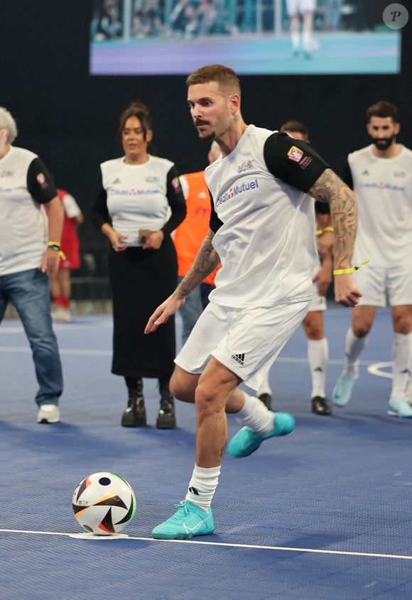 Matt Pokora (M. Pokora) - Match de futsal lors de la nouvelle édition du Foot-Concert organisé par le Réseau A.Ma.N.D./Huntington Avenir à la LDLC Arena à Lyon le 11 Novembre 2024. Cet événement solidaire unique en France rassemble le sport et la musique pour lutter contre les maladies neurodégénératives. © Dominique Jacovides/Bestimage
