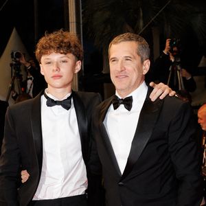 Marcel Canet et son père Guillaume Canet - Descente des marches du film " Karma " lors du 79ème Festival International du Film de Cannes, le 15 mai 2026. © Jacovides-Moreau / Bestimage