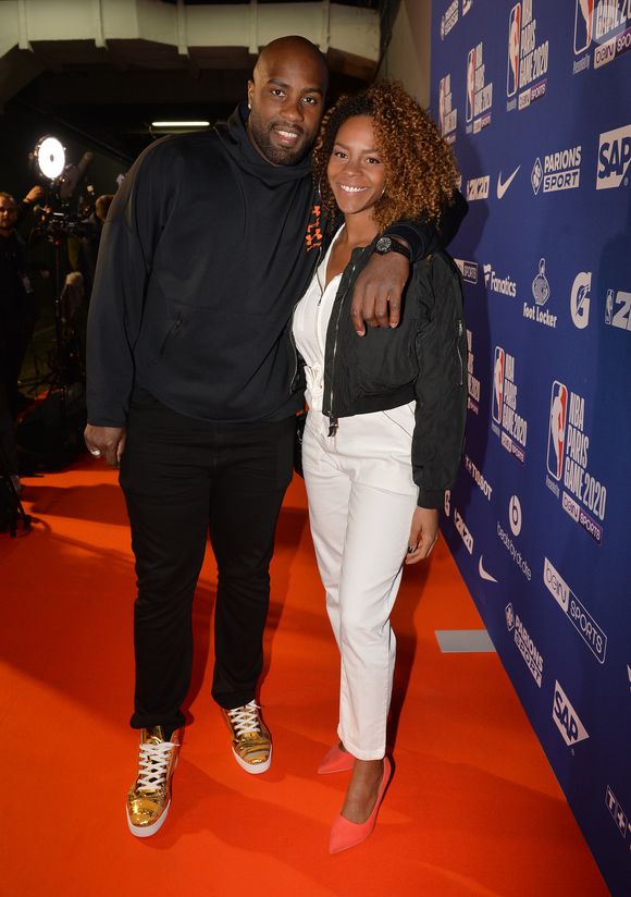 Teddy Riner et sa compagne Luthna Plocus au match de NBA Game Paris 2020 entre les Bucks de Milwaukee et les Charlotte Hornet à l'AccorHotels Arena à Paris le 24 janvier 2020. © Veeren / Bestimage