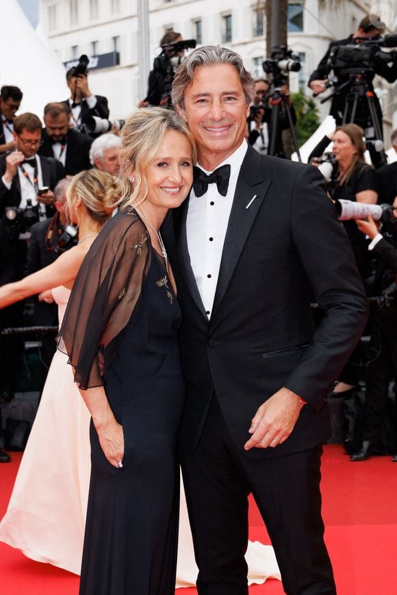 Caroline Roux et son mari Laurent Solly - Montée des marches du film " Eddington " lors du 78ème Festival International du Film de Cannes, au Palais des Festivals à Cannes. Le 16 mai 2025
© Jacovides-Moreau / Bestimage