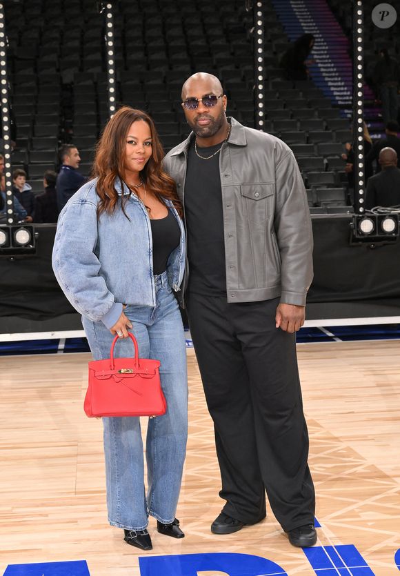 Teddy Riner et sa compagne  Luthna Plocus - Match de gala NBA Jam team Teddy Riner contre team Esteban Ocon lors du NBA Paris Games 2025 à L'Accor Arena Bercy le 24 janvier 2025 © Ramsamy Veeren / Bestimage