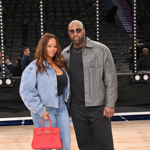 Teddy Riner et sa compagne  Luthna Plocus - Match de gala NBA Jam team Teddy Riner contre team Esteban Ocon lors du NBA Paris Games 2025 à L'Accor Arena Bercy le 24 janvier 2025 © Ramsamy Veeren / Bestimage