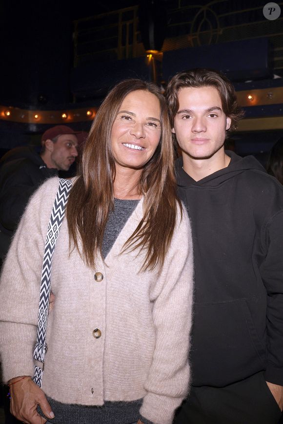 Nathalie Marquay Pernaut avec son fils Tom à la 150 ème du spectacle "Tombé du ciel" de Jeanfi Janssens à la Comédie des Champs Elysées à Paris le 13 février 2025. Spectacle suivi d'une réception Restaurant Manko.
© Cédric Perrin / Bestimage