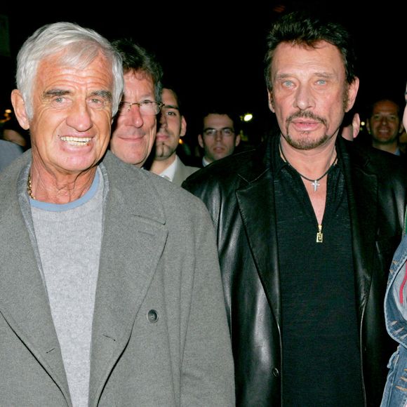 Laeticia Hallyday, Johnny Hallyday, Jean-Paule Belmondo et sa compagne Natty au club de l'étoile de paris en 2003 - ©Rindoff - Bellack Bestimage