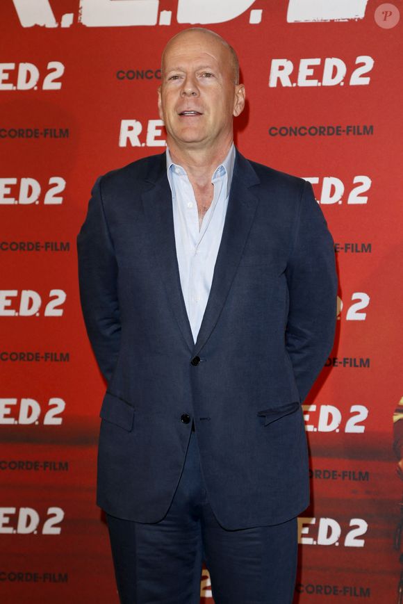 Des révélations faites cette semaine par le réalisateur Glenn Gordon Caron.
Bruce Willis lors du photocall du film "Red 2" a l'hotel Mandarin Oriental a Munich. Le 24 juillet 2013 