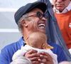 Sur la photo, Jenaye porte sa petite sœur dans ses bras et affiche un grand sourire.

Yannick Noah et sa fille Keelaani lors de l'hommage à R.Nadal lors des internationaux de France de tennis à Roland Garros. © Jacovides / Moreau / Bestimage
