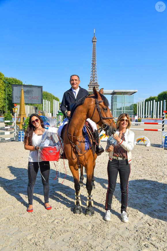 Serge Varsano sur Luca Toni 204 (3ème) avec Virginie Coupérie-Eiffel pendant la remise du Prix Nacricare lors du Longines Paris Eiffel Jumping au Champ de Mars à Paris, France, le premier 7 juillet 2019. © Pierre Perusseau/Bestimage