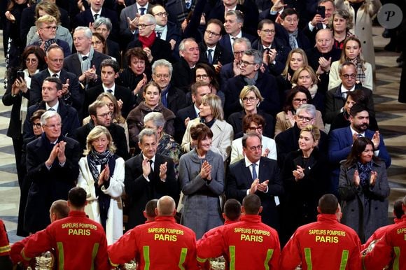 Michel Barnier, sa femme Isabelle Altmayer, Nicolas Sarkozy, sa femme Carla Bruni, François Hollande et sa femme Julie Gayet, Anne Hidalgo rendent hommage aux pompiers de Paris - Cérémonie de réouverture de la cathédrale Notre-Dame de Paris, le 7 décembre 2024. Joyau de l’art gothique, lieu de culte et de culture, symbole universel de la France et de son histoire, la cathédrale de Notre-Dame de Paris rouvre ses portes les 7 et 8 décembre, cinq ans après le terrible incendie qui l’avait ravagée le 15 avril 2019. 
© Dominique Jacovides / Bestimage