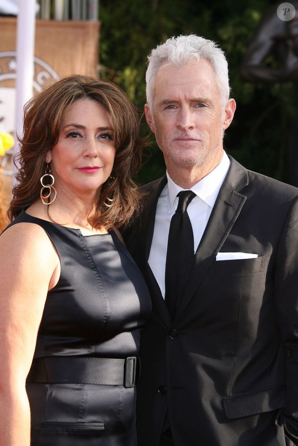 En effet, Talia Balsam file le parfait amour avec John Slattery

Talia Balsam et son actuel mari John Slattery en 2009. © Abaca