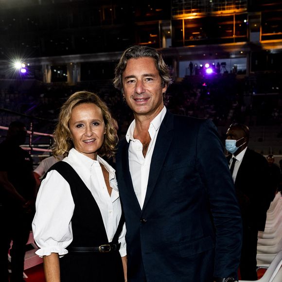 Laurent Solly et sa compagne Caroline Roux - People et politiques se retrouvent au gala de boxe "La Conquête" au stade Roland Garros à Paris le 10 septembre 2021

© JB Autissier / Panoramic / Bestimage