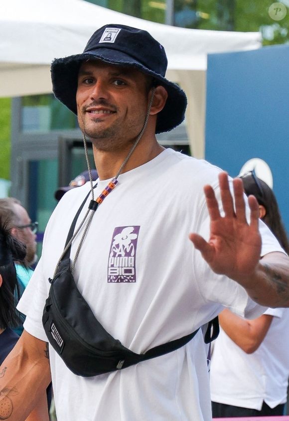 Paris, FRANCE  - Florent Manaudou and Lola Dumenil hand in hand at the France Germany basketball semi-final Olympic Games Paris 2024 in Paris, France.



Pictured: Florent Manaudou, Lola Dumenil