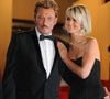 En 2022, Laeticia Hallyday révélait qu'un petit frère vietnamien devait rejoindre Jade et Joy en 2009.
Johnny et Laeticia Hallyday quittent la première de Vengeance lors du 62ème Festival de Film au Palais des Festivals à Cannes, France, le 17 mai 2009. Photo by Doug Peters/PA Photos/ABACAPRESS.COM