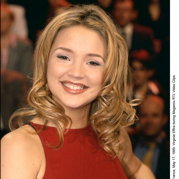 Elle est arrivée en France au début des années 2000. Elle officiait alors à la télé belge.

Virginie Efira lors du Megamix RTL Video Clips. Paris-France, 17 mai 1999. © ABACA. 55159-1