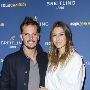 Laury Thilleman (Miss France) et son fiancé Juan Arbelaez lors de la soirée de réouverture de la boutique "Breitling", située rue de la Paix.