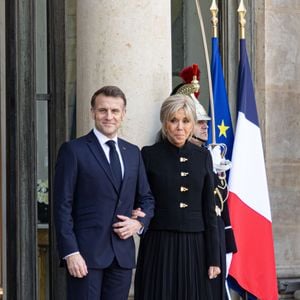 Emmanuel Macron et Brigitte Macron avant un déjeuner de travail au palais de l'Elysée à Paris, le 13 janvier 2026. 

Photo : Florian Savina / Bestimage