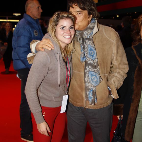 Elle a ajouté un emoji prière, comme pour remercier le club olympien pour cette belle initiative

Archives - Bernard Tapie et sa fille Sophie lors des Gucci Masters 2013 à Paris. Le 7 décembre 2013
© Gwendoline Le Goff / Panoramic / Bestimage