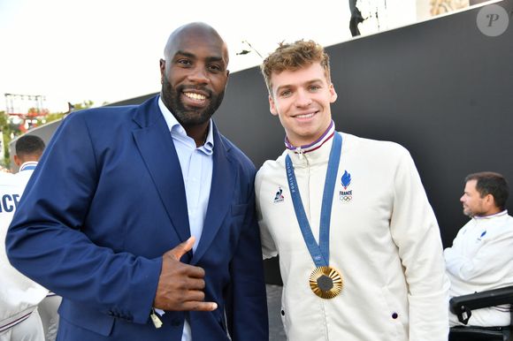 Exclusif - Teddy Riner, Léon Marchand - Remise des médailles par le président de la République à l'Arc de Triomphe aux athlètes lors de la parade des champions à l'occasion des Jeux Olympiques et Paralympiques Paris 2024, sur l'avenue des Champs-Elysées à Paris. Le 14 septembre 2024
© Perusseau-Ramsamy / Bestimage
