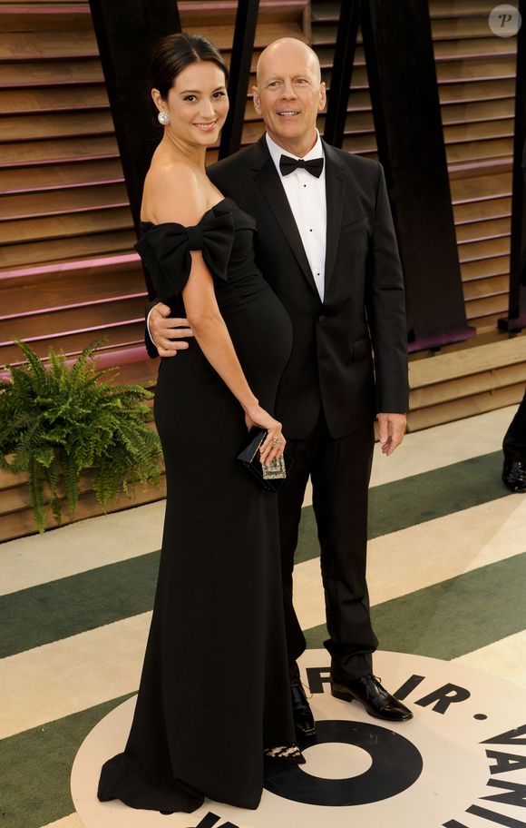 Bruce Willis et sa femme Emma Heming (enceinte) - People à la soirée Vanity fair après les Oscars 2014 à West Hollywood. Le 2 mars 2014. Action Press / Bestimage