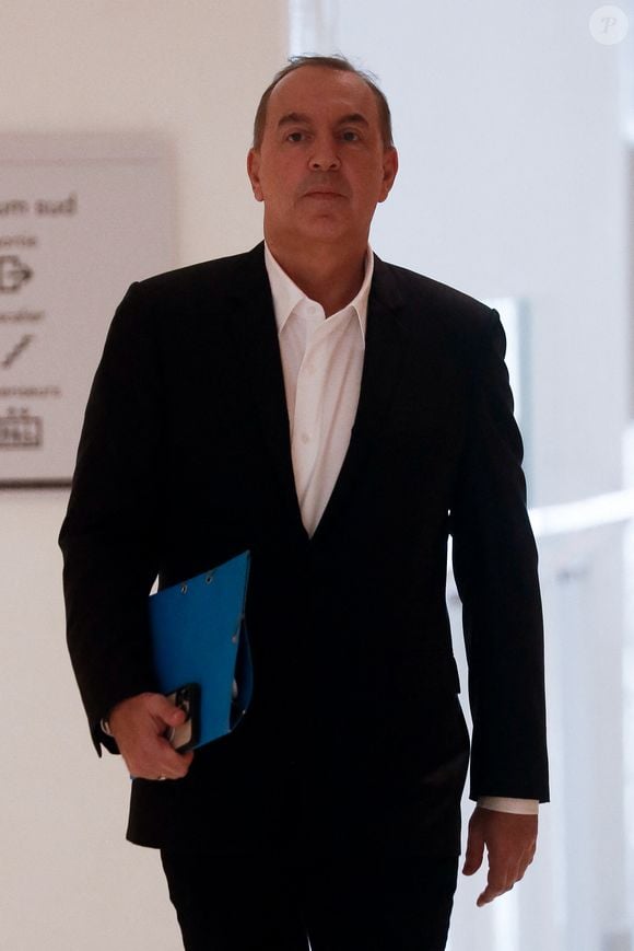Exclusif - L'animateur de radio, journaliste, présentateur de télévision et producteur français, Jean-Marc Morandini, accompagné de son avocate, maître F.Rault, arrive à la chambre correctionnelle du tribunal judiciaire de Paris Batignolles, le 14 juin 2023. Jean-Marc Morandini est jugé pour "harcèlement sexuel" et "travail dissimulé", à Paris, lors du deuxième et dernier jour de son procès.
© Christophe Clovis /Bestimage